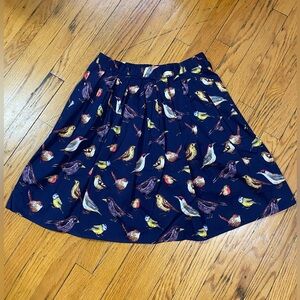 Pleated skirt with birds by Grace Karin